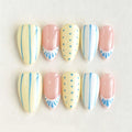 Set of handmade nails with pastel designs on a light background, Obroi