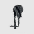 Fur-trimmed hat with a long tail on a light gray background, Obroi