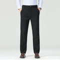 Person wearing black pants on a white background, Obroi