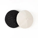 Black beret with star pattern and white beret on a white background, Obroi