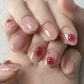 Close-up of a hand with pink glittery nail polish, Obroi