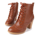 Brown leather lace-up boots on a white background, Obroi