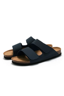 Black sandals with brown soles on a white background, Obroi