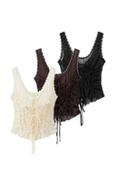 Four lace-trimmed tops in black, brown, and cream on a white background, Obroi
