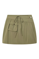 An olive green wrap-style mini skirt with a front flap pocket, drawstring waist, and a small silver metal accent on the side, shown against a plain white background, Obroi