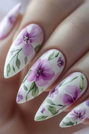 Nails with purple floral design on a white background, Obroi