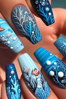 Nails with underwater-themed design featuring fish, corals, and bubbles, Obroi