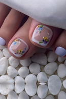 Nails with floral design on a white stone background, Obroi