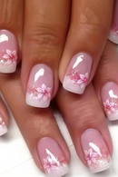 Nails with pink floral design on a white background, Obroi