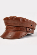 Brown leather cap with textured pattern on a white background, Obroi
