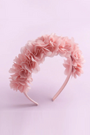 Pink floral headband on a light pink background, Obroi