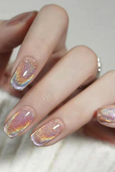 Nails with iridescent glittery nail polish on a neutral background, Obroi