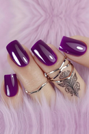 Hand with purple nail polish on a pink textured background, Obroi