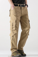 Person wearing beige cargo pants on a white background, Obroi