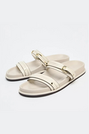 Pair of beige sandals with strap details on a white background, Obroi