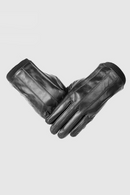 Pair of black leather gloves on a light gray background, Obroi