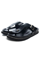 Black sandals with a gold buckle on a white background, Obroi