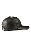 Black leather cap on a white background, Obroi