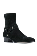 Black suede boot with a strap and buckle on a white background, Obroi