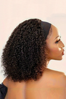 Woman with styled hair wearing a headband against a neutral background, Obroi