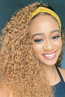 Woman with curly blonde hair wearing a yellow headband against a blue background, Obroi