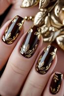 Nails with gold leaf design on a brown background, Obroi