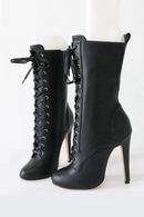 Black high-heeled lace-up boots on a white background, Obroi