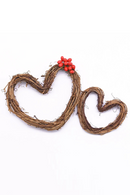 Heart-shaped wreath with red berries on a white background, Obroi
