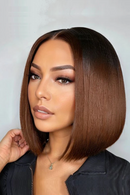 Woman with a stylish bob haircut against a plain background, Obroi