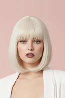 Woman with a blonde bob haircut against a pink background, Obroi