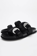 Black sandals with rhinestone embellishments on a white background, Obroi