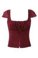 Red leopard print top with a square neckline and short sleeves on a white background, Obroi
