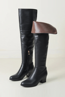Black knee-high boots with a brown foot cover on a white background, Obroi