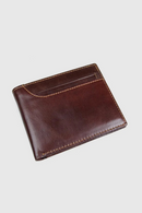 Brown leather wallet on a light gray background, Obroi