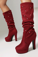 Red platform boots with rhinestone details on a neutral background, Obroi