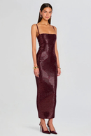 Woman wearing a burgundy sequin dress on a light gray background, Obroi