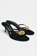 Black high-heeled sandals with gold accents on a light gray background, Obroi