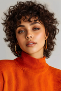 Woman wearing an orange turtleneck sweater with a plain background, Obroi