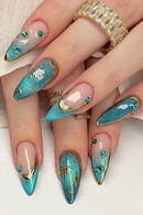 Nails with blue and gold design on a white background, Obroi