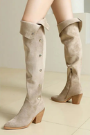 Beige suede knee-high boots on a neutral background, Obroi