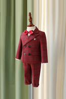 Red checkered suit on a mannequin against a curtain background, Obroi