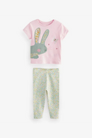 Pink t-shirt with a bunny design and floral pants on a white background, Obroi