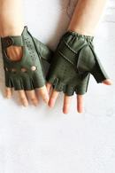 Green leather gloves with fingerless design on a light background, Obroi