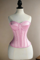 Pink corset on a mannequin against a neutral background, Obroi