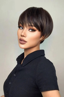 Woman with a stylish haircut against a neutral background, Obroi