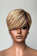 Mannequin head with a styled blonde wig on a plain background, Obroi