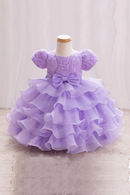 Lavender dress with a bow on a mannequin against a plain background, Obroi