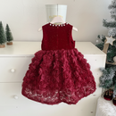 Red dress with floral details on a white surface, Obroi