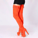 Orange thigh-high boots with high heels on a white background