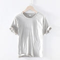 T-shirt d'été à manches courtes pour hommes, col rond, en coton respirant, jaune doux, style décontracté, de haute qualité